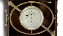 Marine chronometer with two going-barrels